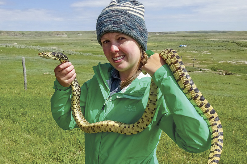 Tera Edkins with a bull snake